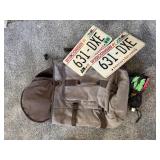 Backpack, license plates, umbrella