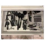 Contents of kitchen utensil drawer, organizers