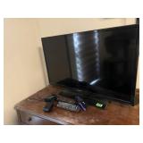Samsung 32" television, remote controls, Roku
