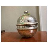 Silver jar, candle
