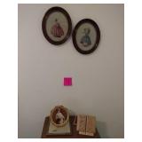 Nightstand with cross stitch pictures and frames