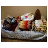 Twin bed, bedding, afghans and pillows
