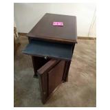 End table with magazine holder and writing pull