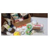 painting supplies, rollers, tape, bucket