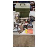 drill and other tools in green box