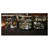 3 small glass display cases with animal figures