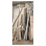 2 sheets of OSB and pile of scrap wood