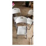 three folding chairs