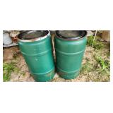 two small plastic barrels with tops