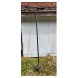 rod with ground screw anchor