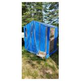 blue ice fishing shack