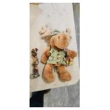 Moose doll and statue