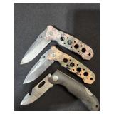 three folding knives