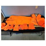 variety of used blaze orange hunting clothing