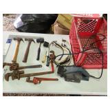 red crate with tools, hammers