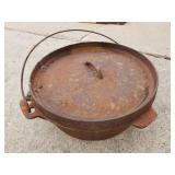 cast dutch oven, been in fire