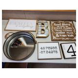 signs and mirror decor
