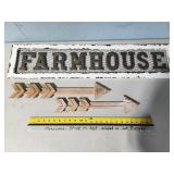 farmhouse and arrow signs