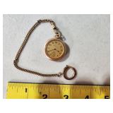 small gold filled pocket watch, works