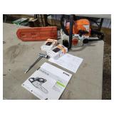 Stihl MS180 saw, 2 new chains, tools