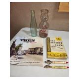 Escanaba Cen. book, milk & beer bottles