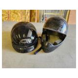 two motorcycle helmets