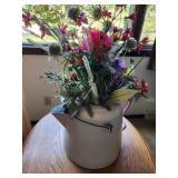 enamelware pitcher with fake flowers