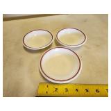 three Corning bowls