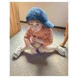 sitting porcelain doll