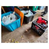 totes and crate with Christmas lights and decor