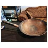 large WOK with ring for cooking on a stove burner