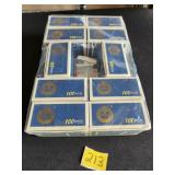 ten boxes of coin sleeves/holders