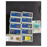 10 boxes of coin sleeves and stapler