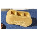 Small handcrafted wooden remote control holder