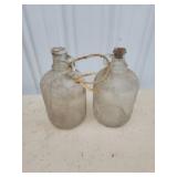 Two vintage glass gallon jugs