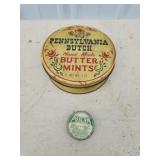 Two vintage tin storage cans