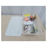 Small storage tote of assorted doll parts