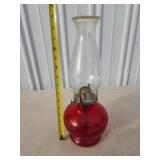 Antique vintage oil lamp, cranberry red