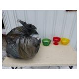 Bag of assorted plastic dishware, ideal for