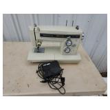 Kenmore model 16250 sewing machine with pedal