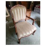 Vintage wooden frame upholstered arm chair Vintage wooden frame upholstered arm chair