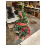 Decorated lighted artificial potted Christmas Decorated lighted artificial potted Christmas