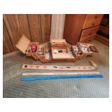 Wooden sewing box with contents and measuring Wooden sewing box with contents and measuring