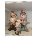 3 assorted ceramic and plastic yard gnomes 3 assorted ceramic and plastic yard gnomes
