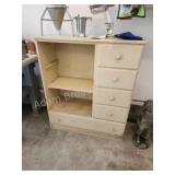 Wooden garage storage cabinet, contents on top Wooden garage storage cabinet, contents on top