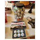 Assorted golf balls and tees Assorted golf balls and tees