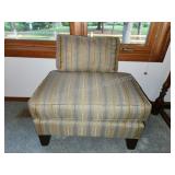 Modern upholstered ottoman with matching throw