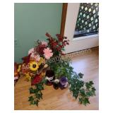 Assorted faux flowers and flower vases