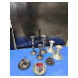 Assorted pewter and painted brass candle holders Assorted pewter and painted brass candle holders