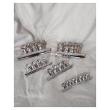 24 Various size chromed clamps 24 Various size chromed clamps